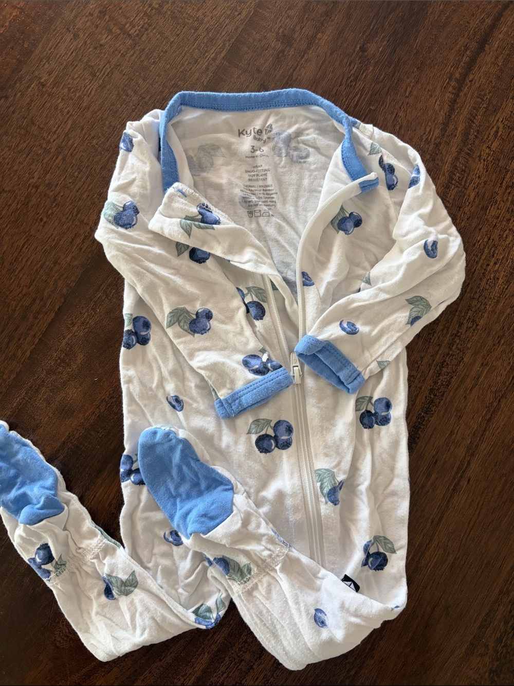 Kyte BABY White Zip Footed Sleeper with Blue Berry Print